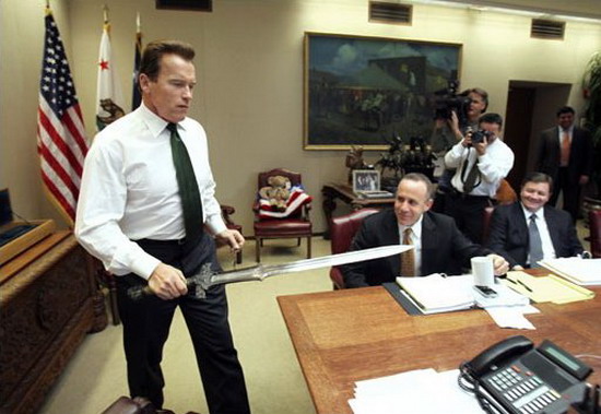 Arnold Schwarzenegger brings his Conan sword to the conference