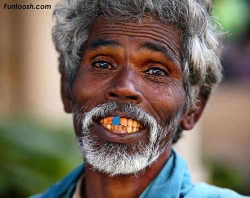 Man with blue tooth