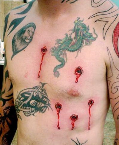 Bullet holes tattoo