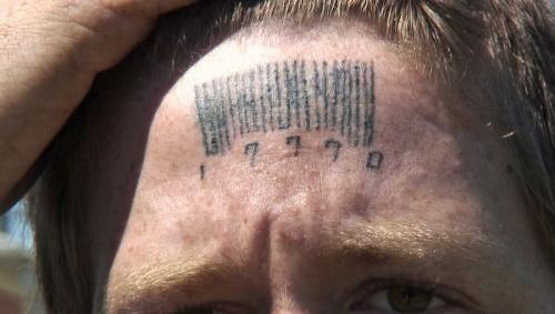 RAPEST forehead tattoo